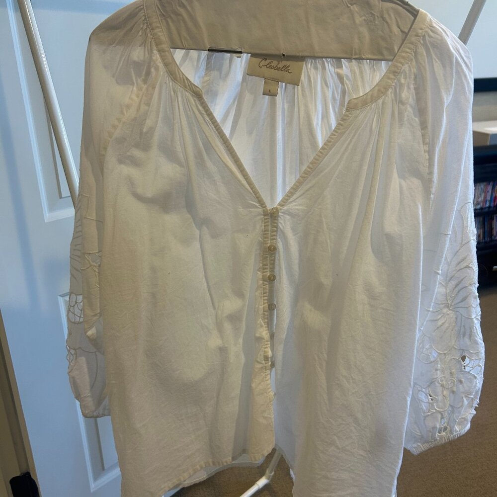 White blouse with lace sleeves